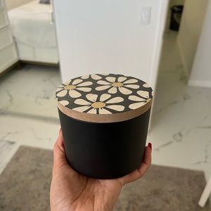 Cute black jar with lid.